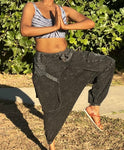 Front leg up view of black acid wash cotton drop-crotch pants