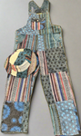 Flat lay front view of blue patchwork cotton overalls