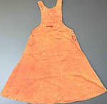 Handmade burnt orange cotton overall dress laid flat front view