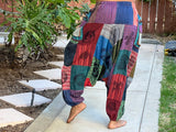 Back view of patchwork harem pants with relaxed fit