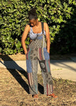 Front view of handmade patchwork cotton overalls worn outdoors