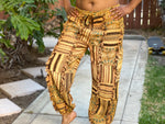 Front view of handmade sunflower patchwork pants with relaxed fit