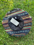 Inside view of patchwork bucket hat showing stitching and bottom detail